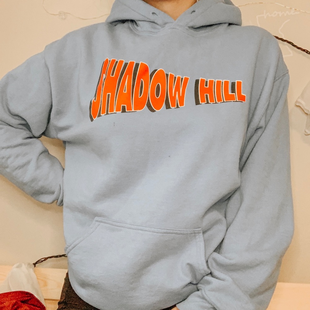 a blue shadow hill sweatshirt
